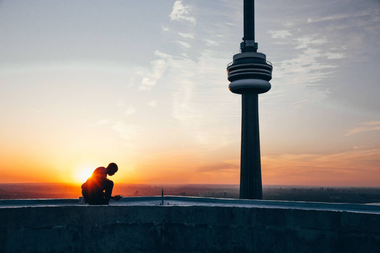 architecture, building, infrastructure, sky, skyscraper, tower, sunset, sunlight, horizon, rooftop, people, man, guy, silhouette, clouds, landscape, view
, 