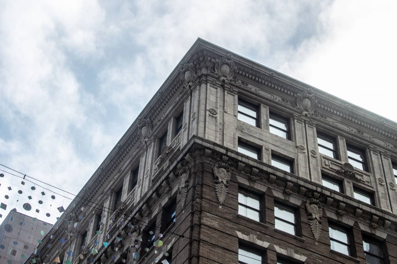 city, building, angle, sky, windows, detail, architecture, structure, office, urban, corner, wall, old, apartment, ornate, clouds
, 