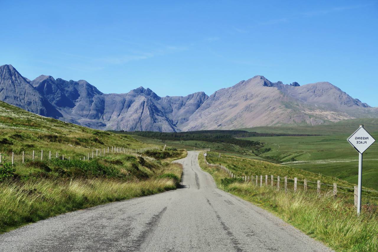 green, grass, fence, sign, road, mountain, highland, blue, sky, outdoor, nature
, 