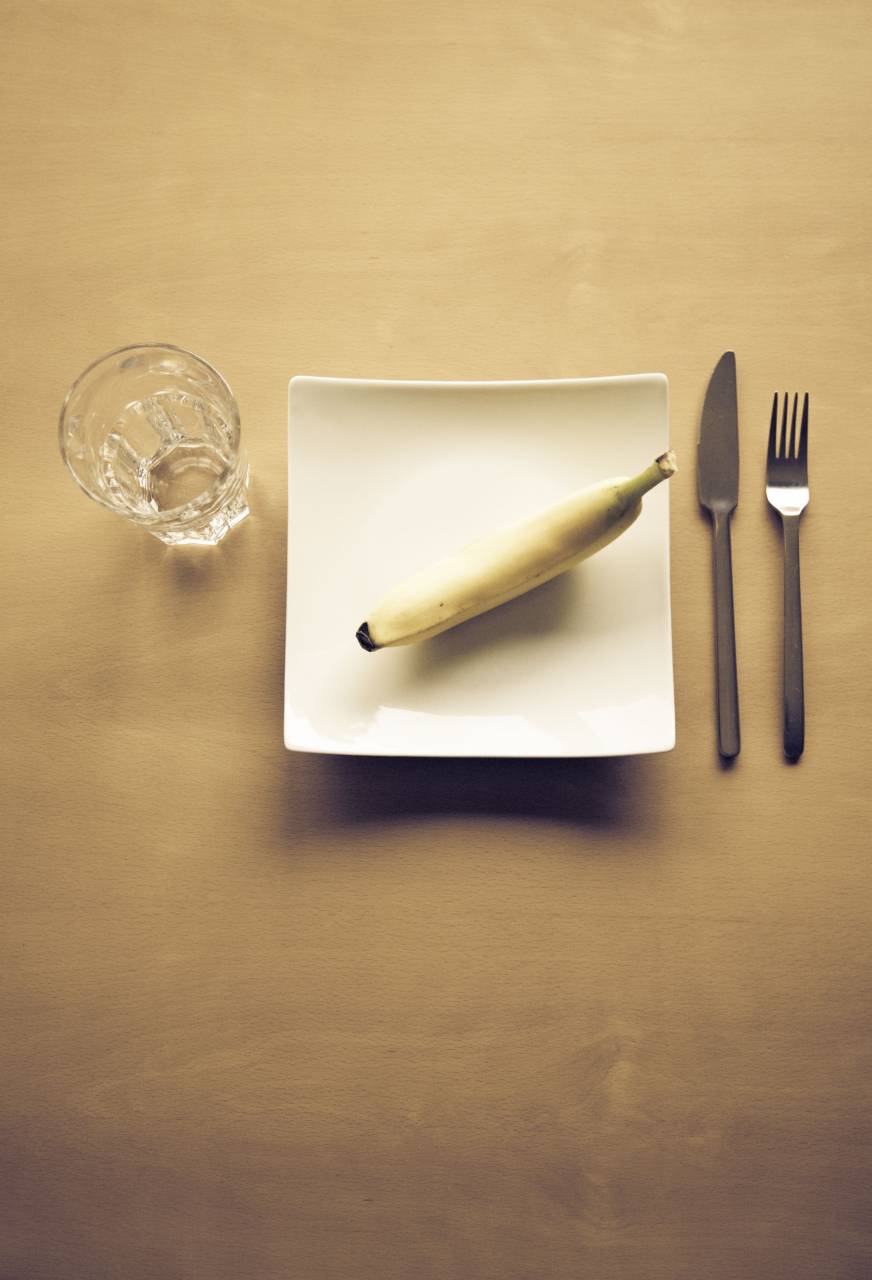 table, banana, fruit, dessert, food, plate, fork, knife, cutlery, restaurant, glass
, 