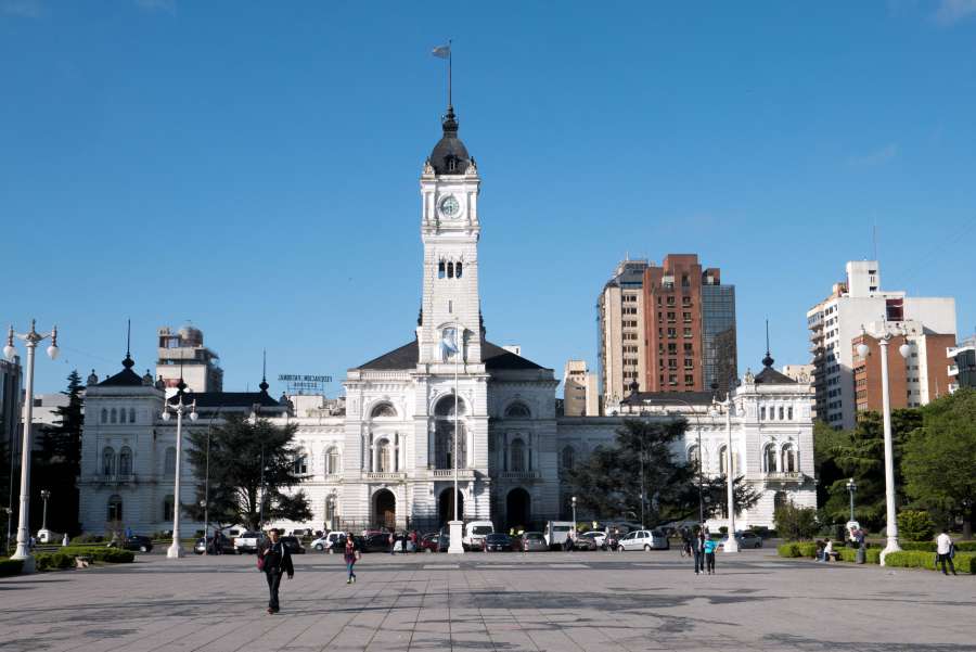 argentina, outdoor, sunlight, america, municipal, sculpture, travel, yellow, trees, attraction, south, locations, history, palace, statute, old, historic, provincia, architecture, art, royal, statues, exterior, statuary, south america, buenos aires, square, historical, town, tropical, municipalidad, urban, landmark, government, castle, outside, sights, building, la plata, world, city, blue, sky, monument, palm, plaza, capital, 