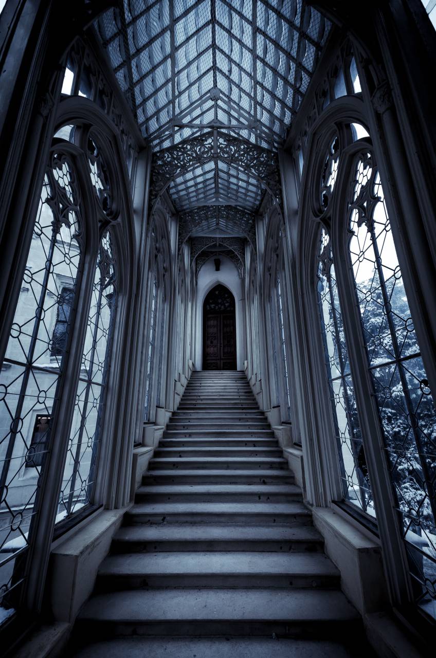 vampire;house,architecture,indoors,window,built structure,religion,staircase,corridor,ceiling,inside of,old,christianity,vanishing point,famous place,steps,arch,gothic style, 