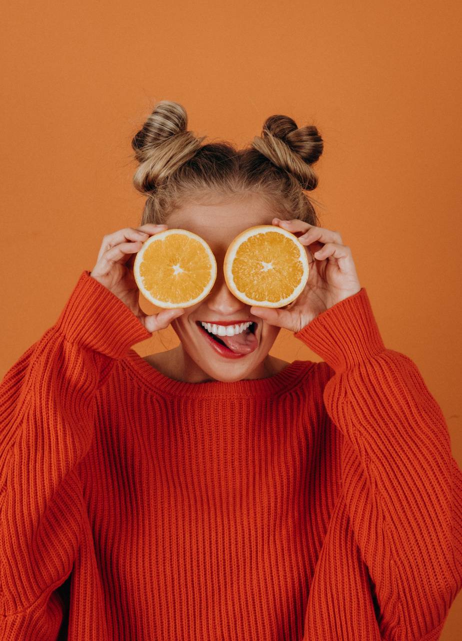 Portrait, Young Model, Posing, Oranges, Smiling, Playful, Fresh, Fruit, Healthy, Natural, Beauty, Joyful, Happy, Creative, Fun, Vibrant, Juicy, Citrus, Expressive, Unconventional, Whimsical, Unique, Colorful, Fashion, Stylish, Glamour, Attractive, Chic, Trendy, Positive, 