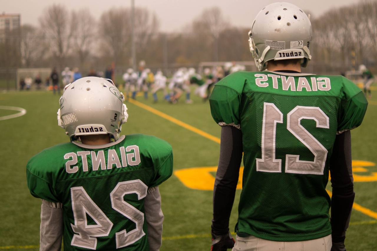 football, teammates, giants, field, sports, athletes, uniform, helmets, green
, 
