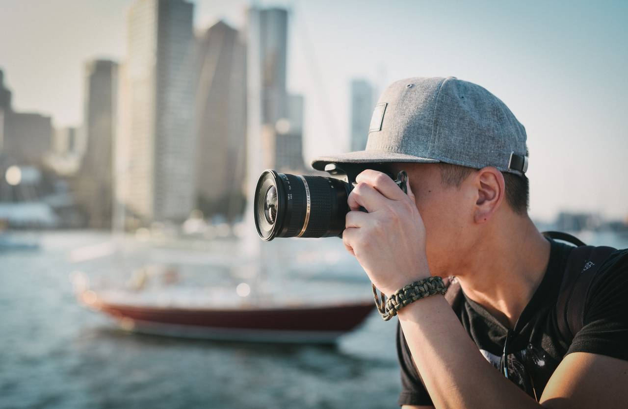guy, man, people, boat, camera, buildings, water
, 