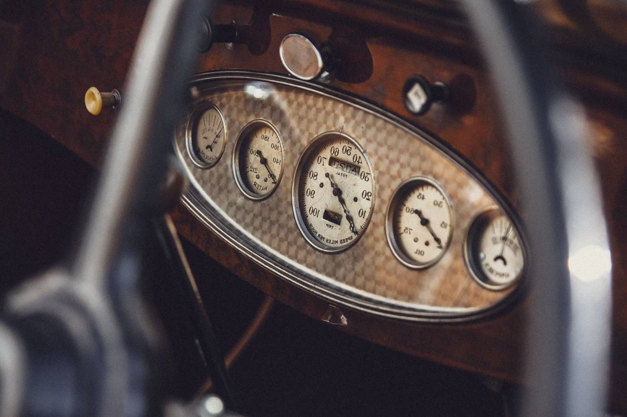 old, speedometer, car, dashboard, retro, interior, vehicle, classic, style, auto, antique, design, steering, vintage, automobile, transportation, transport, luxury, speed, wheel, inside, chrome, metal, shiny, shine, leather, control, detail, red, panel, old-timer, instrument, automotive, ancient, drive, black, model, classical, equipment, nostalgia, elegant, white, cockpit, convertible, knob, restored, sixties, roadster, counter, machine, 