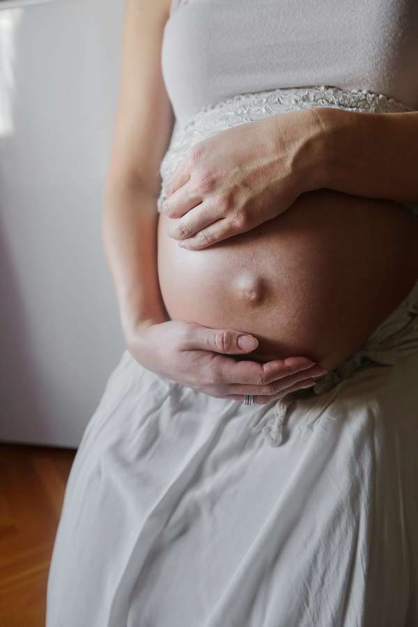 pregnancy, woman, tummy, pregnant, baby, belly, mother, female, parent, motherhood, abdomen, maternity, expecting, love, care, happy, beautiful, young, life, girl, expectant, parenthood, white, home, child, awaiting, maternal, birth, people, family, healthy, mom, childbirth, waiting, touch, anticipation, hand, person, new, bedroom, bed, concept, lifestyle, stomach, expectation, indoors, leisure, touching, adult, resting