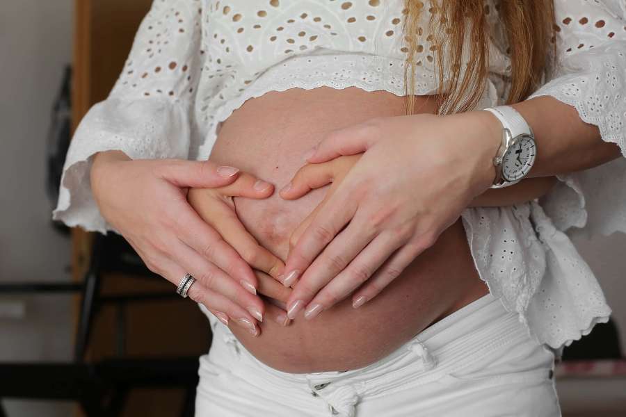 pregnancy, woman, tummy, pregnant, baby, belly, mother, female, parent, motherhood, abdomen, maternity, expecting, love, care, happy, beautiful, young, life, girl, expectant, parenthood, white, home, child, awaiting, maternal, birth, people, family, healthy, mom, childbirth, waiting, touch, anticipation, hand, person, new, bedroom, bed, concept, lifestyle, stomach, expectation, indoors, leisure, touching, adult, resting