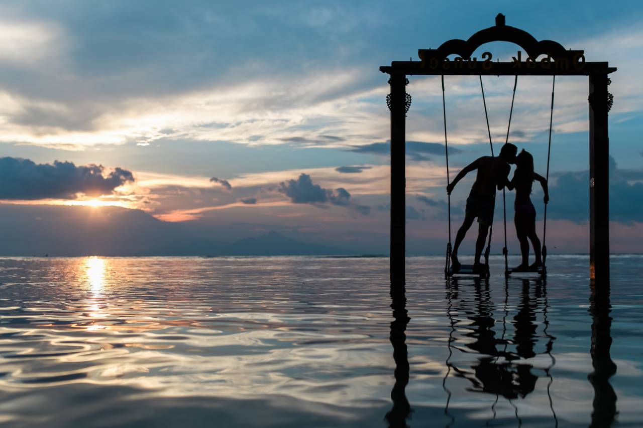 couple, kissing, love, romance, swing, ocean, sea, sunset, dusk, silhouette, clouds, people
, 