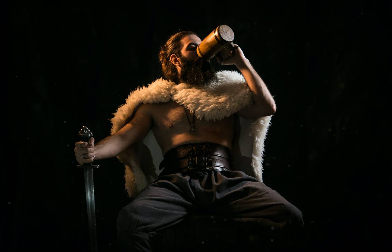 Viking warrior, portrait, battle ready, axe, sword, shield, helmet, armor, chainmail, fur, beard, mustache, long hair, angry, fierce, determined, brave, strong, warrior culture, Norse mythology, Scandinavia, 9th century, 10th century, historical reenactment, beer, hidromiel, 