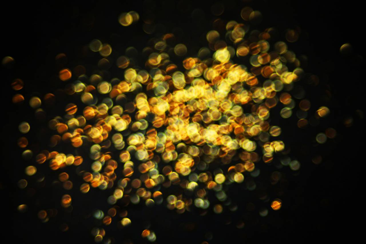 background;lights,defocused,abstract,backgrounds,shiny,night,glowing,illuminated,celebration,bright,circle,pattern,glitter,backdrop,decoration,multi colored,yellow,dark,photographic effects,lighting equipment,colors, 