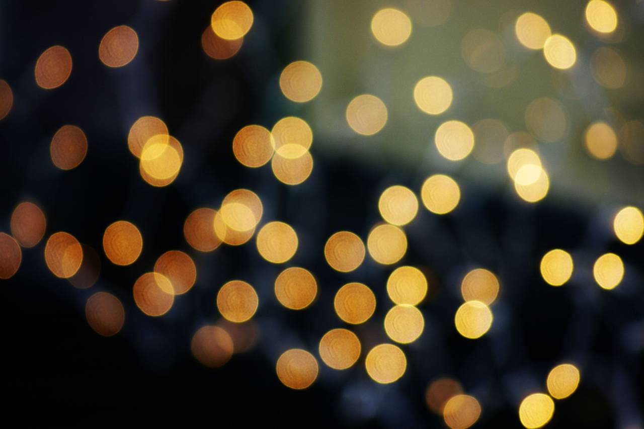 background;lights,defocused,backgrounds,abstract,shiny,night,glowing,illuminated,bright,yellow,pattern,celebration,lighting equipment,glitter,circle,backdrop,close-up,multi colored,dark,vibrant color,decoration,gold colored,photographic effects,blurred motion,christmas lights,light,natural phenomenon, 