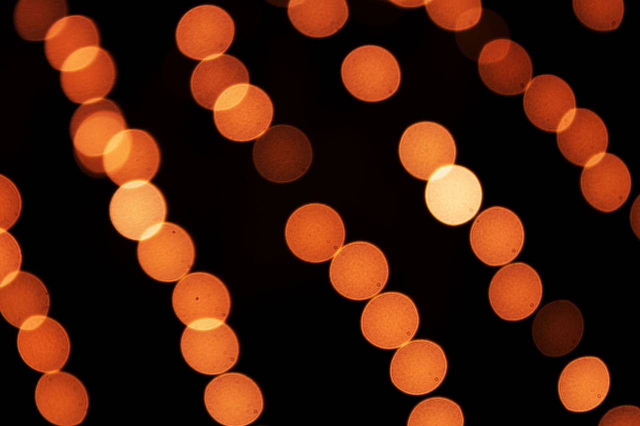 fondo;luces,noche,fondos,resumen,desenfocado,brillante,brillante,iluminado,brillante,oscuro,amarillo,equipo de iluminación,patrón,celebración,telón de fondo,decoración,primer plano,círculo,