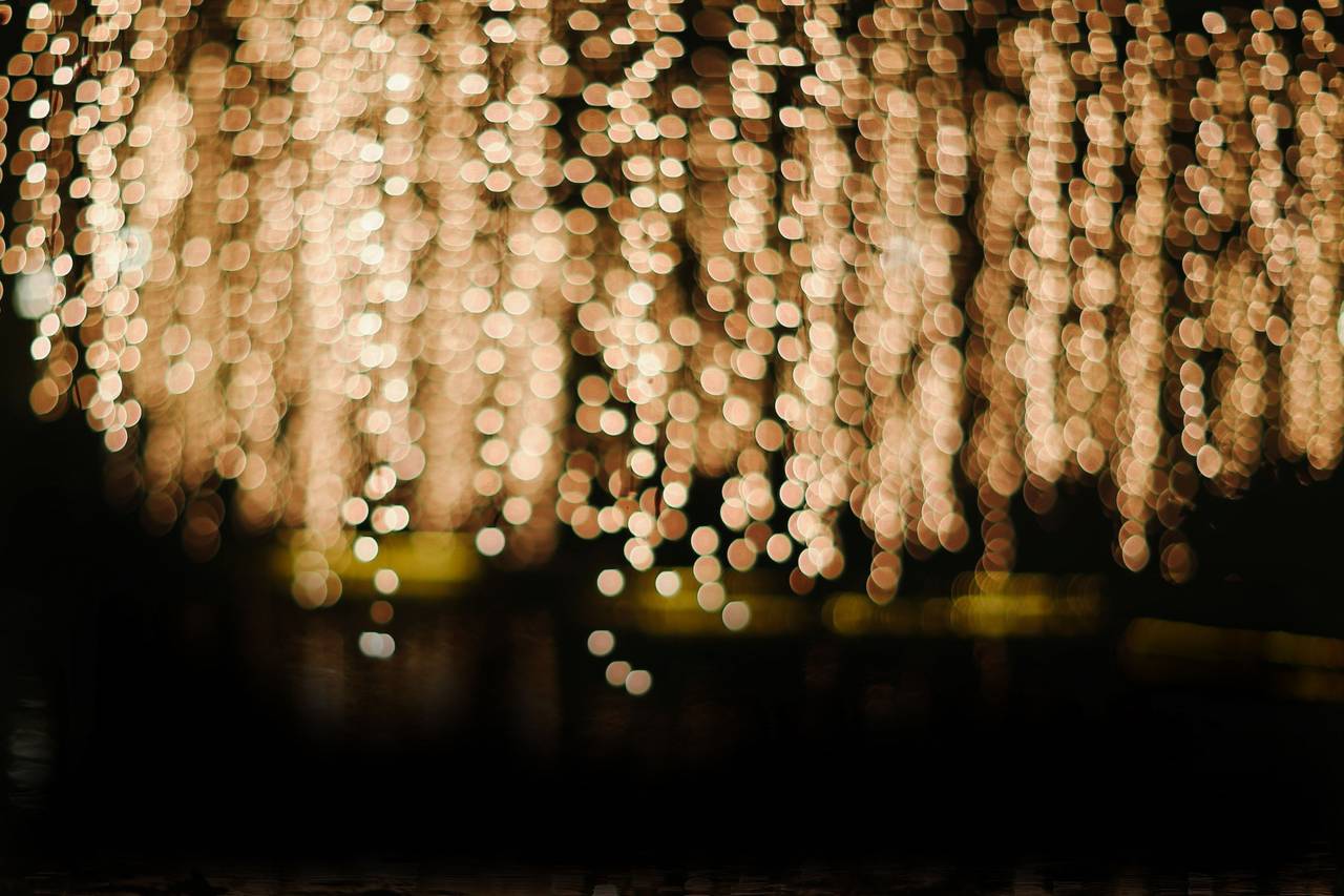 background;lights,defocused,abstract,backgrounds,night,shiny,glowing,illuminated,bright,celebration,backdrop,lighting equipment,pattern,dark,circle,glitter,decoration,nature,multi colored,yellow,blurred motion,photographic effects, 