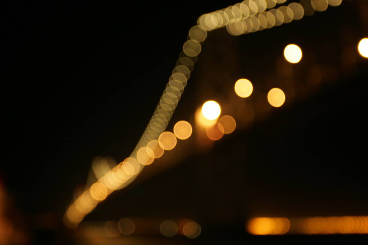 background;lights,night,defocused,backgrounds,abstract,illuminated,glowing,lighting equipment,dark,shiny,nightlife,celebration,yellow,bright,blurred motion,multi colored,circle,decoration,backdrop,pattern,street light,dusk, 