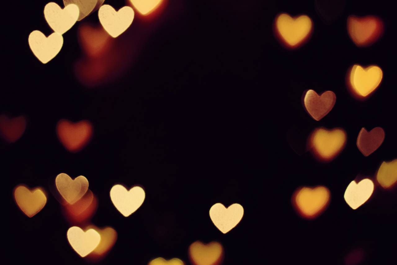 background;lights,abstract,backgrounds,love,romance,defocused,night,glowing,heart shape,celebration,shiny,decoration,illuminated,pattern,dark,bright,backdrop,shape,yellow,black background,glitter, 