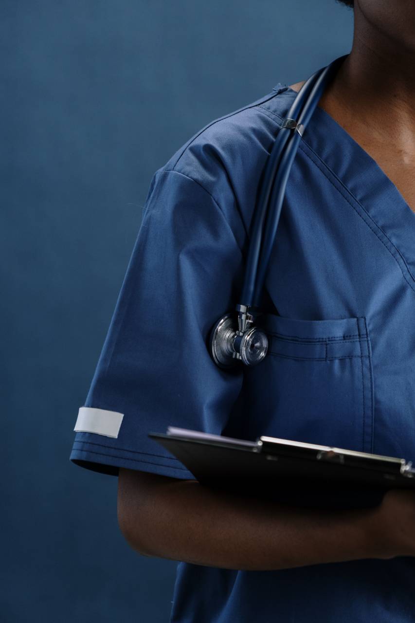 Doctor;woman;portrait,doctor,healthcare and medicine,stethoscope,men,occupation,one person,professional occupation,uniform,hospital,adult,males,surgeon,general practitioner,blue,expertise,medicine,medical occupation,close-up,caucasian ethnicity,nurse, 