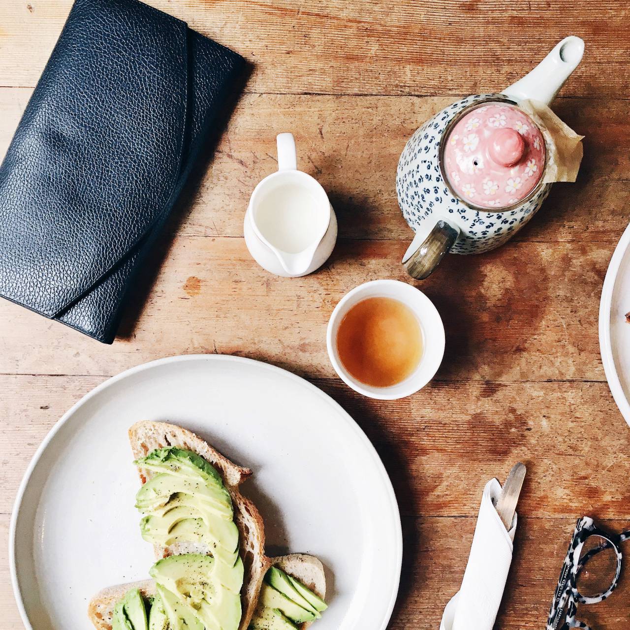 bread, avocado, breakfast, diet, table, tea, pot, drink, milk, wallet, wooden, table
, 