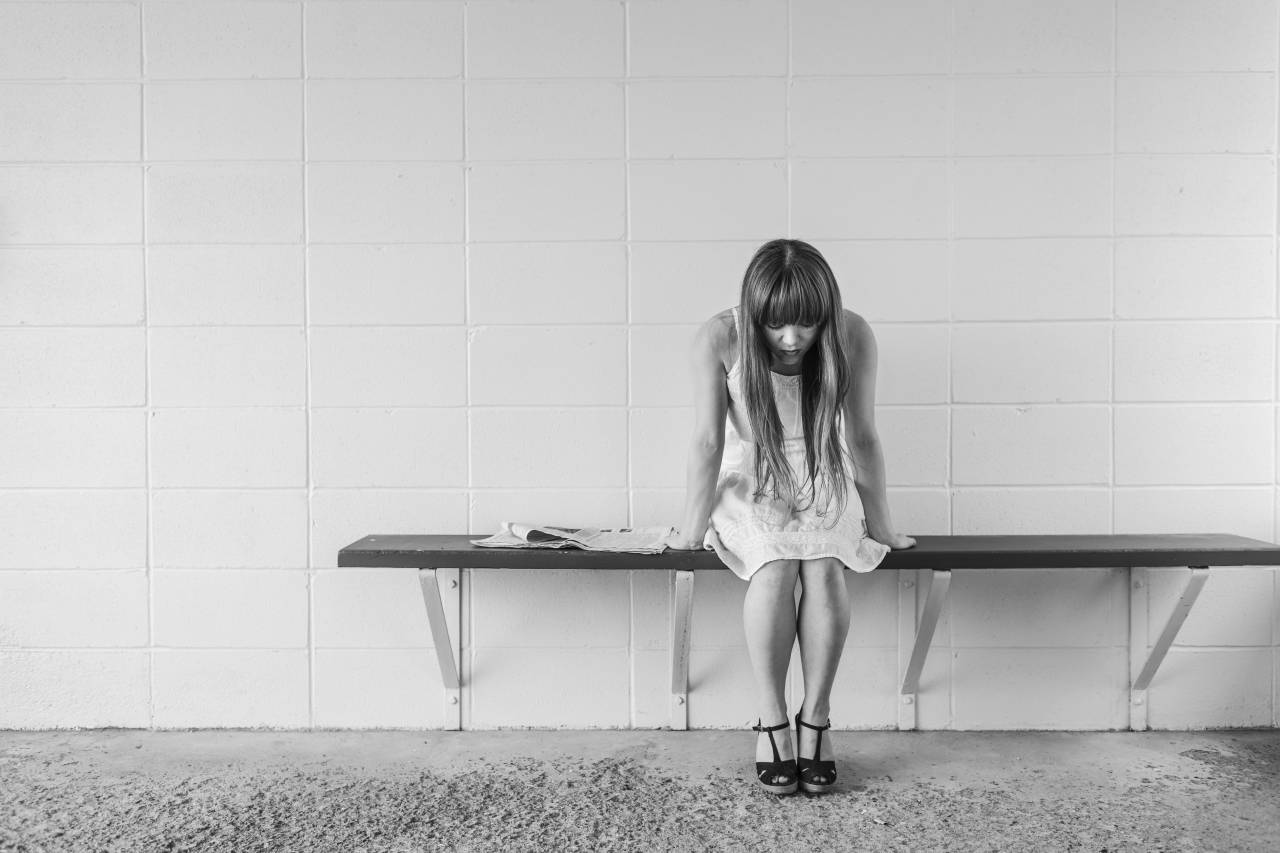 girl, woman, people, brunette, long hair, dress, legs, feet, shoes, bench, sitting, newspaper, concrete, wall, sad
, 