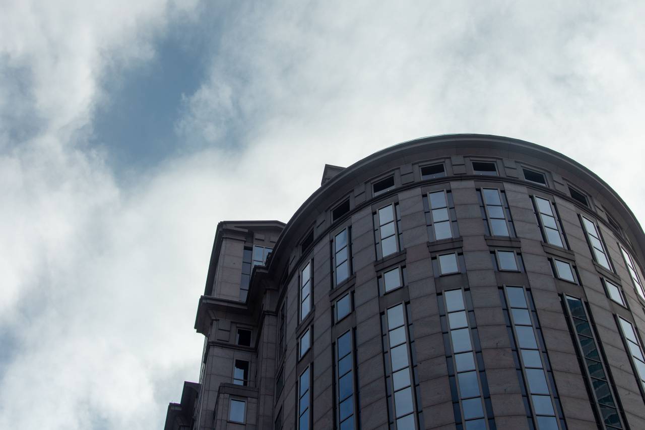 mordern, building, exterior, city, tall, downtown, architecture, office, round, sky, clouds, windows, design, angle, perspective, business
, 