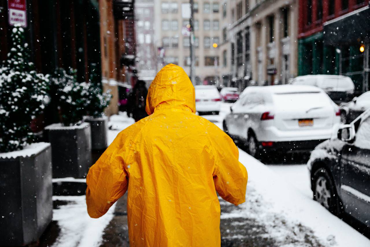 people, man, orange, snow, winter, cold, weather, urban, city, car, vehicle, transportation
, 