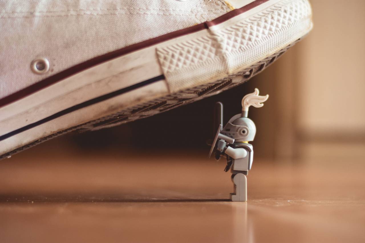 robot, toy, action figure, figure, shoes, sneakers, converse, soldier, armor, shield, floor, small
, 