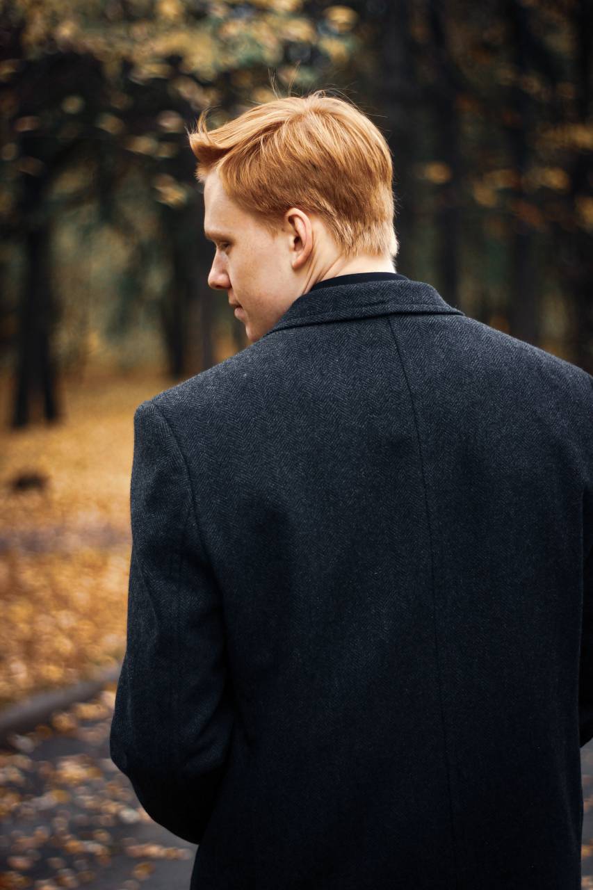 suit,men,one person,outdoors,caucasian ethnicity,adult,males,nature,businessman,lifestyles,young adult,suit,business person,rear view,autumn,looking,tree,forest,one,man, 