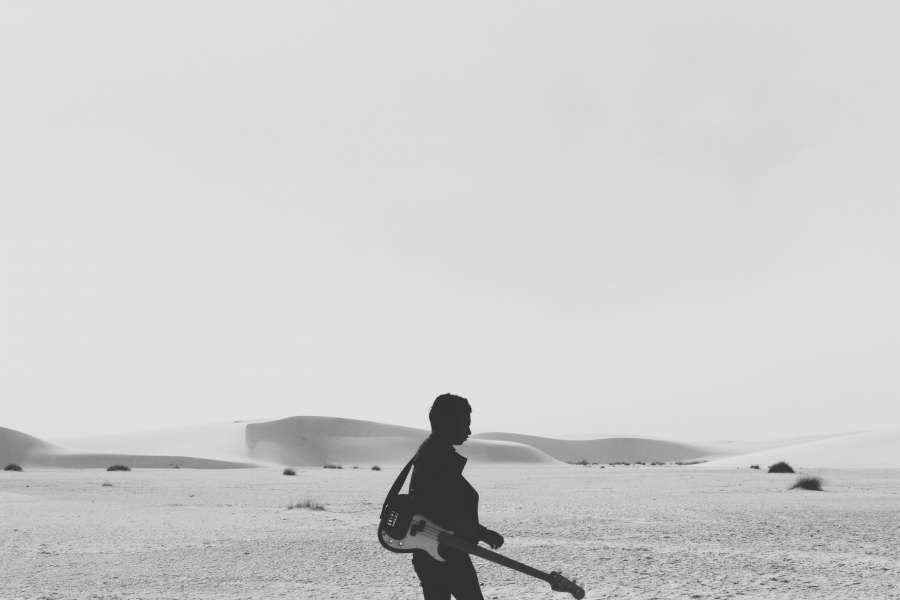 black and white, sky, desert, sand, hills, dunes, woman, silhouette, shadow, electric guitar, music, instrument
, 