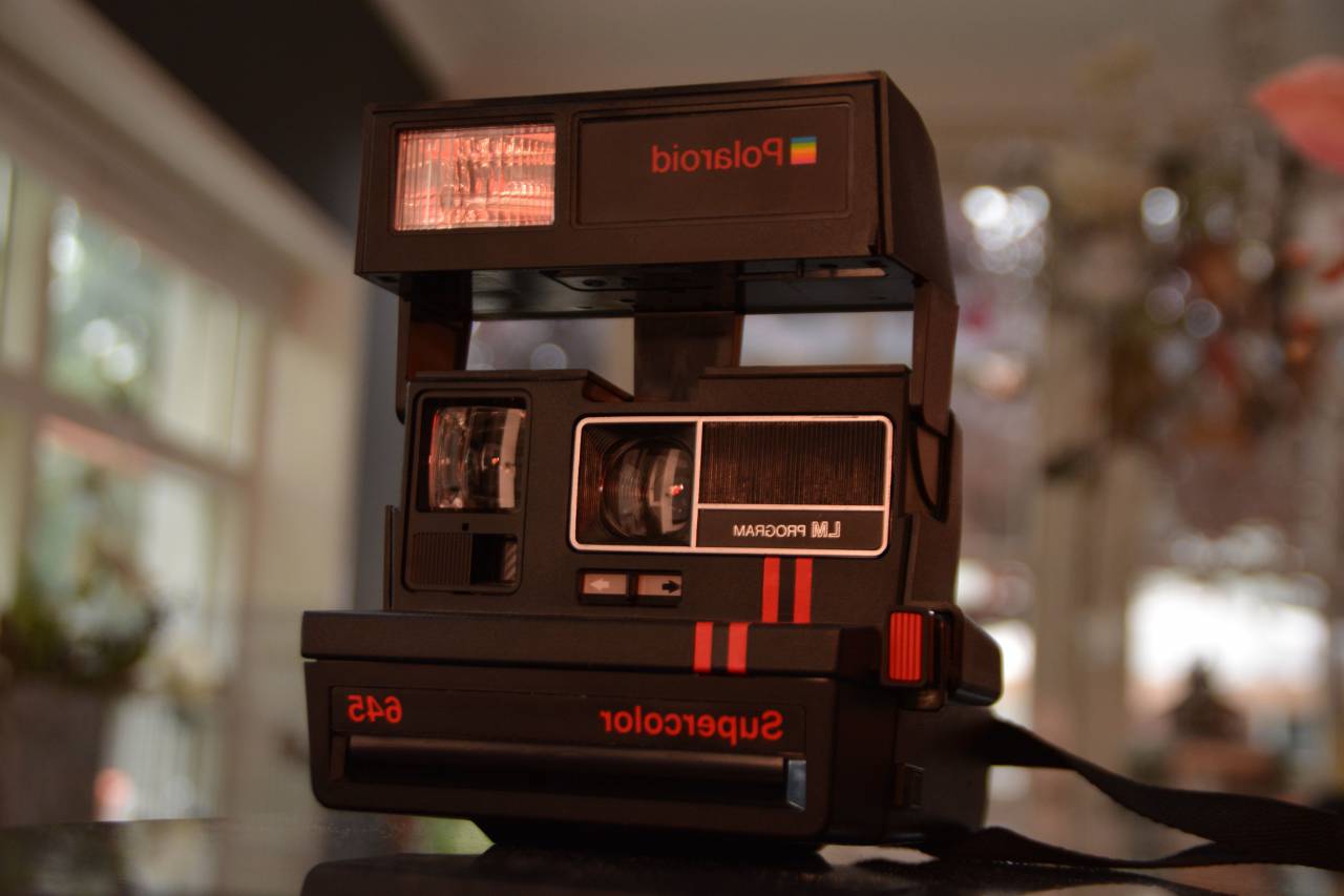 camera, polaroid, vintage, black, flash, bokeh, blur, lace, indoor, house, windows, panes, shoot
, 
