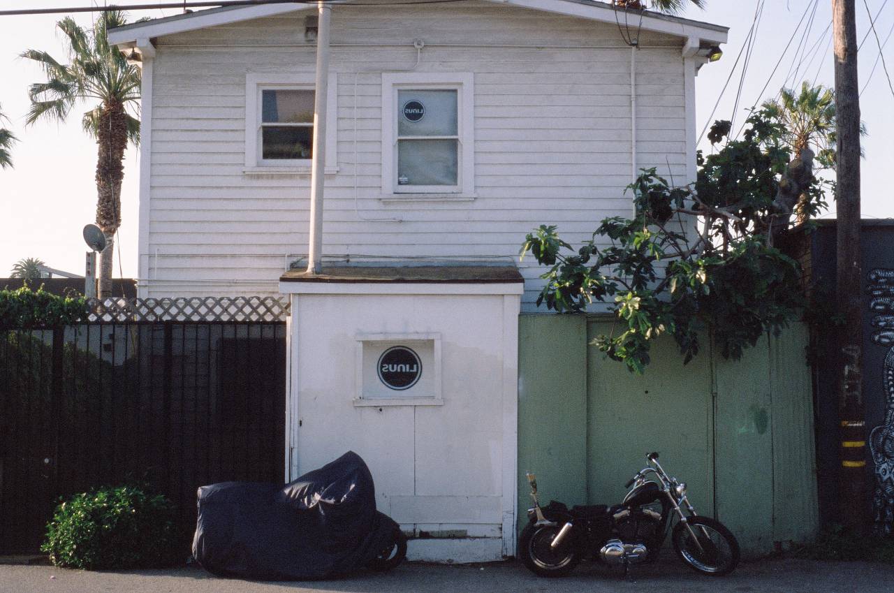 linus, bike, motorcycle, house, palm trees, siding, windows
, 