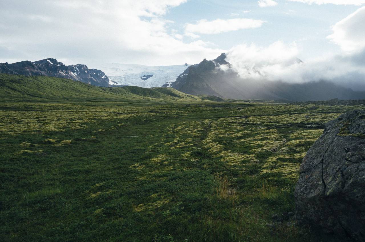 mountains, peaks, snow, rocks, cliffs, hills, valleys, outdoors, fields, valleys, grass, clouds, sky
, 