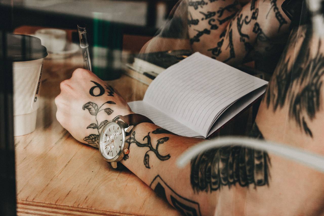 people, man, reading, book, wooden, table, wrist, watch, body, tattoo, art
, 