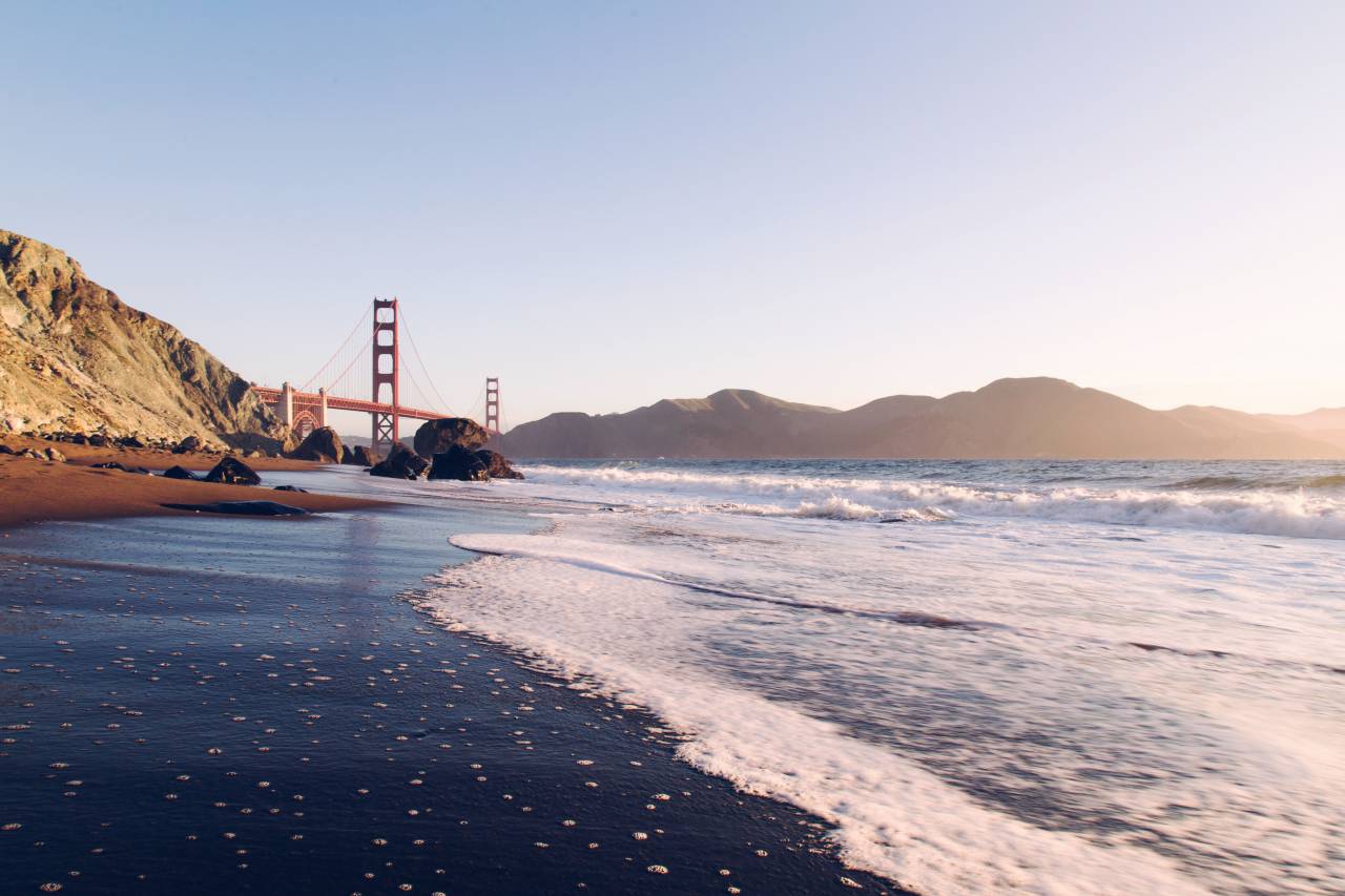 sea, ocean, blue, water, nature, rock, cliff, beach, coast, shore, bridge, structure, sky, mountain, landscape
, 