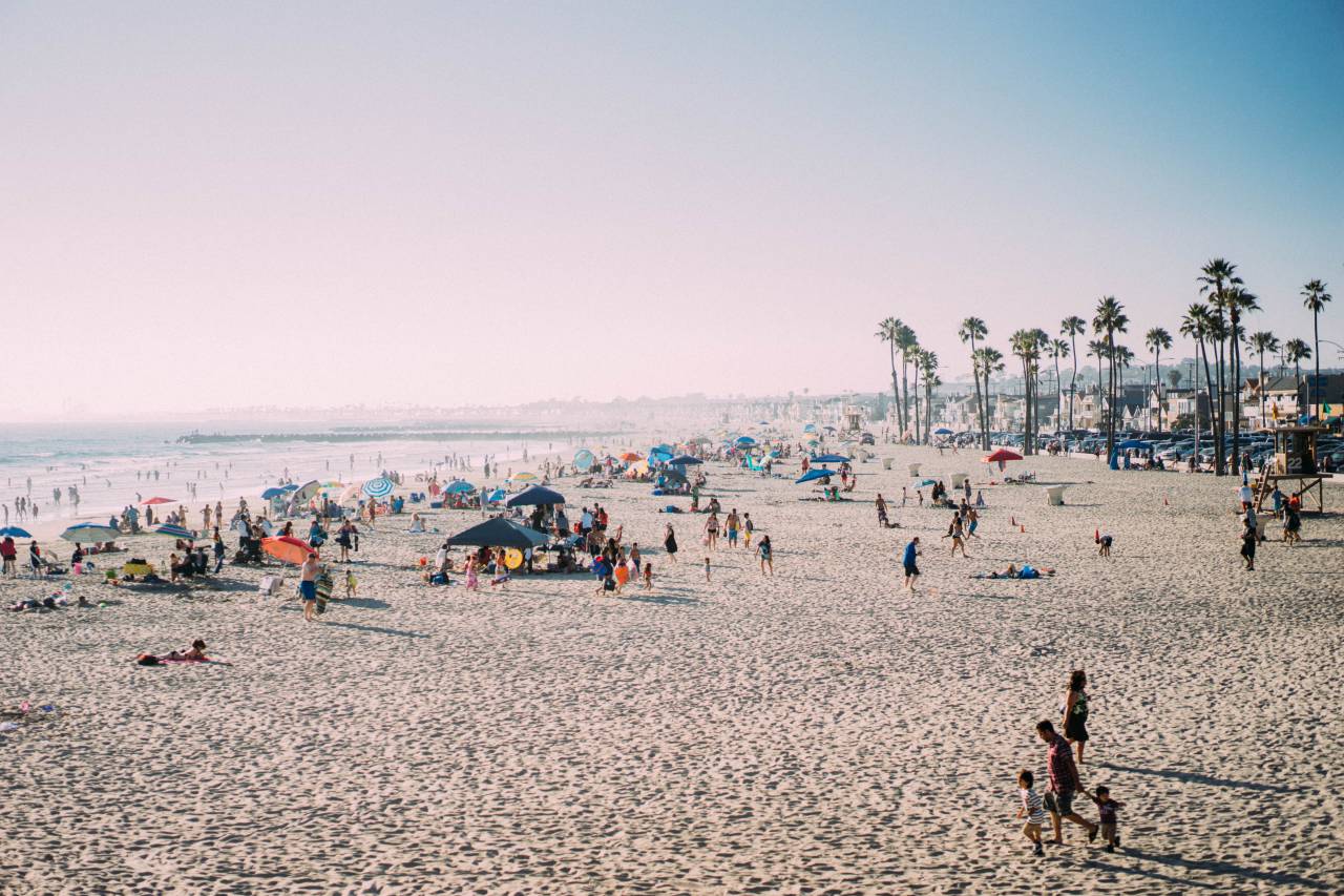 sea, ocean, water, waves, beach, umbrella, sand, shore, people, crowd, swimming, adventure, outdoor, trees, plant, summer, vacation
, 