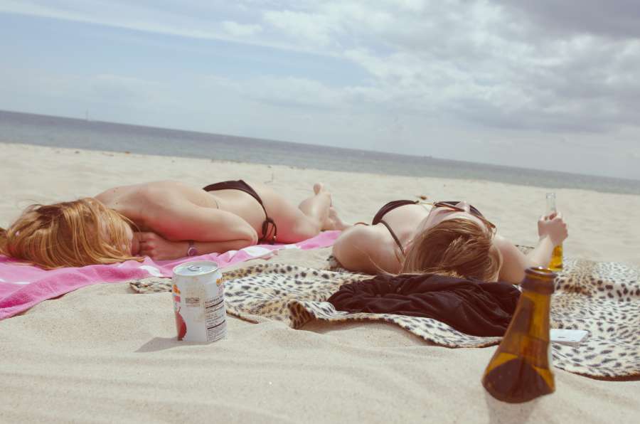 sky, clouds, sun, summer, beach, sand, water, tanning, girls, women, bathing suit, swimsuit, swimming, drinks, beer, bottles, towels, hot, sunglasses, sleeping, people, friends
, 