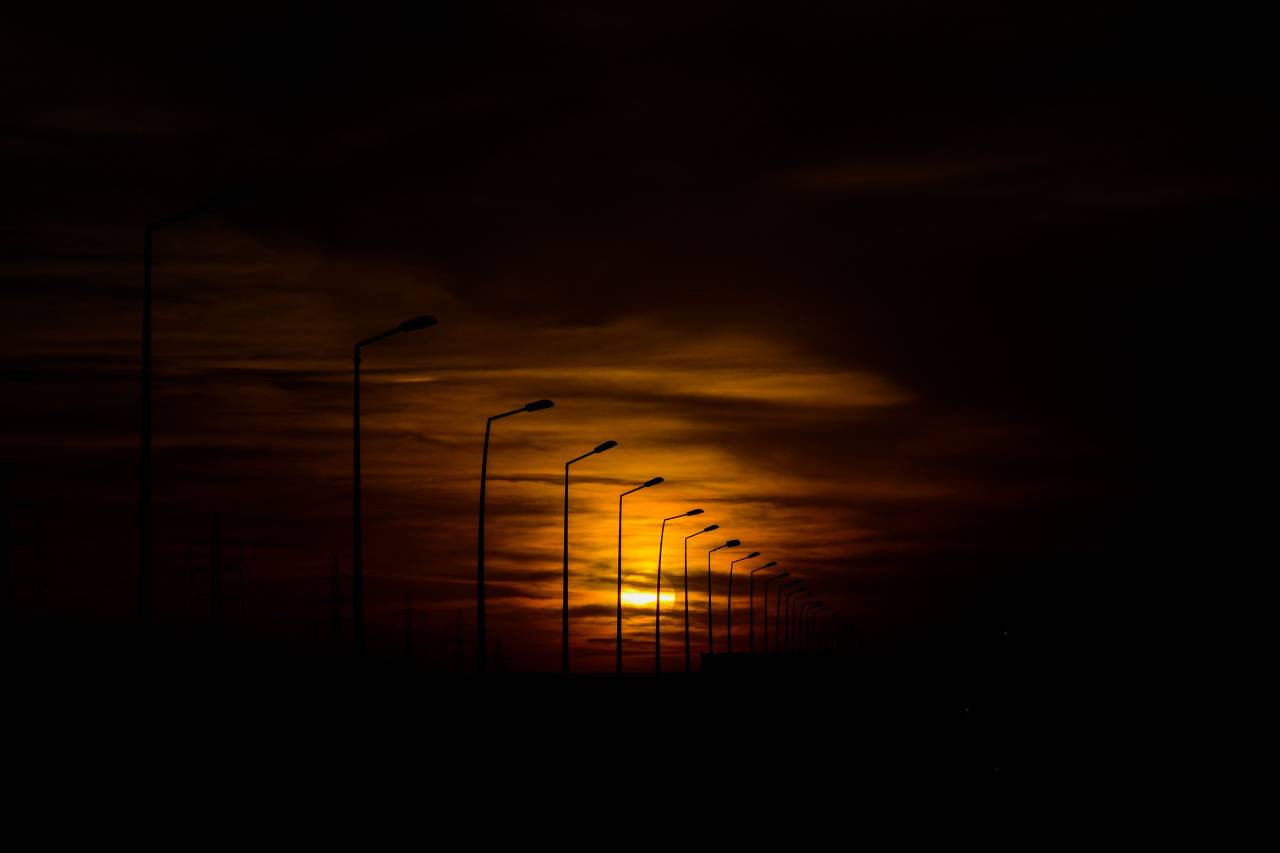 nature, sky, dusk, dawn, sunset, sunrise, sun, sinister, clouds, row, line, lamps, light, posts, silhouette, shadows
, 