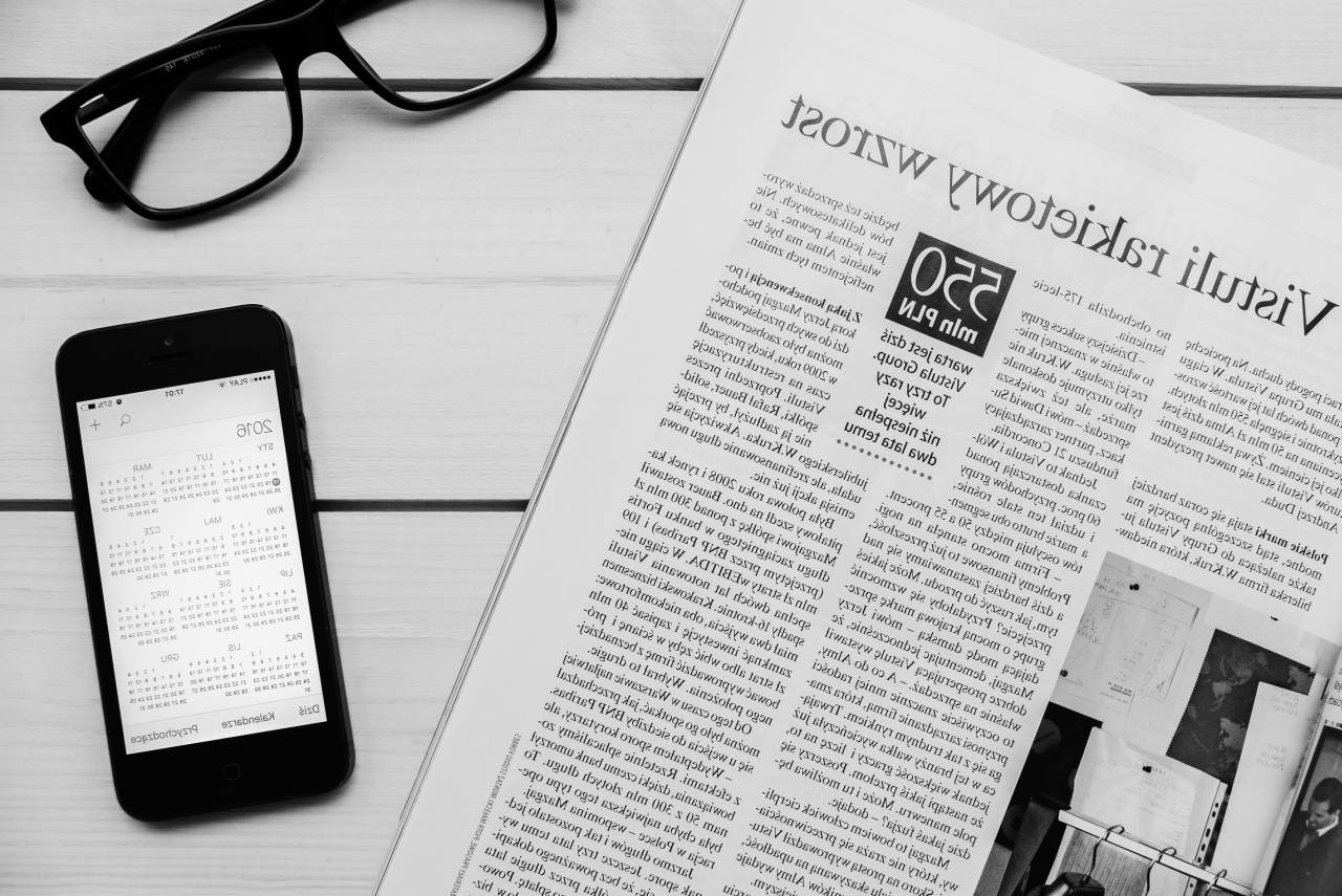 newspaper, magazine, reading, calendar, iphone, mobile, smart phone, cell phone, business, eyeglasses, black and white
, 
