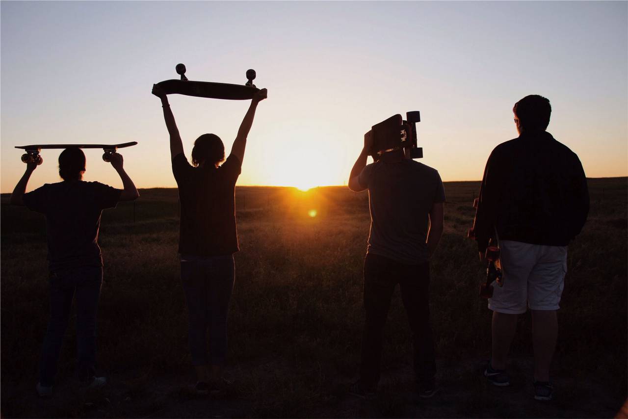sunset, skaters, skateboards, skateboarding, people, young, guys, boys, silhouette, shadows, dusk, friends, group
, 