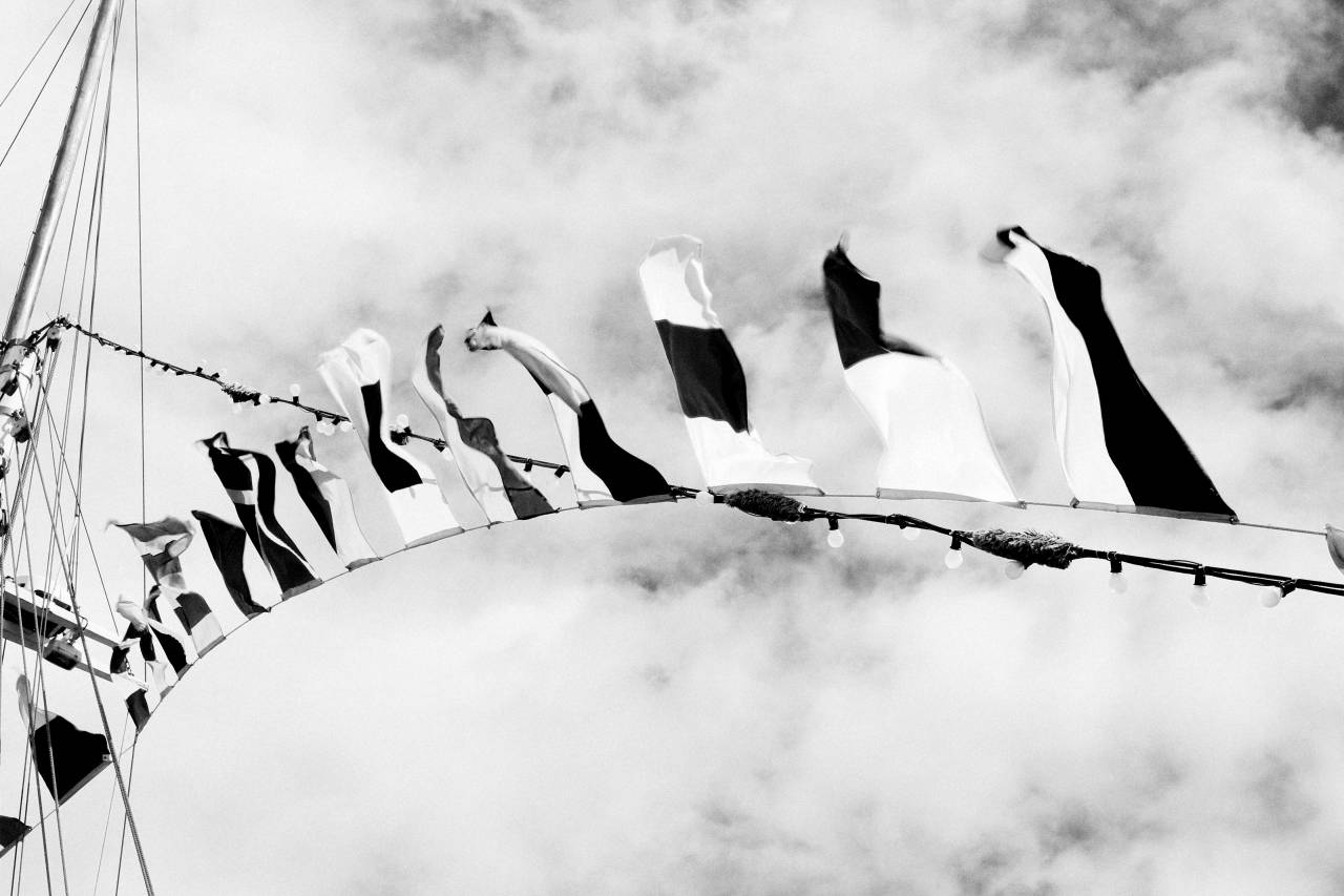 black and white, flags, string, fairy lights, ropes, sailboat, sky, clouds
, 