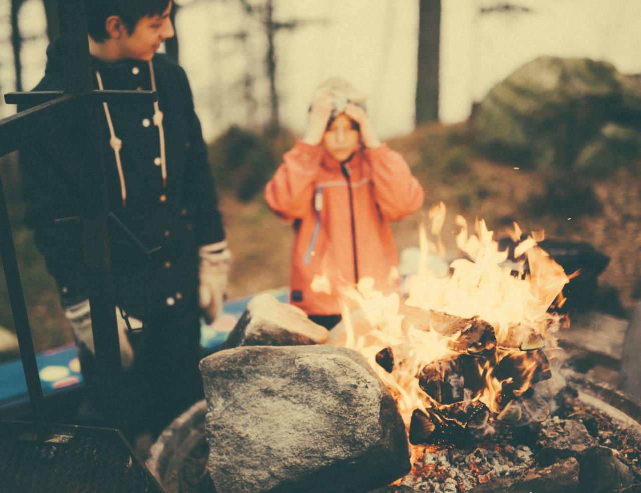 fire, camp, people, kid, man, cold, weather, jacket, forest, woods, rock, spark
, 