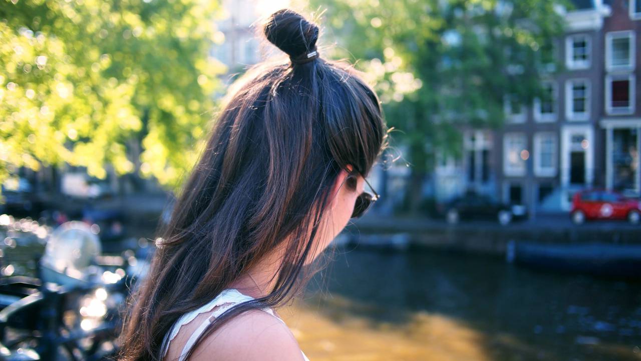 people, woman, bun, green, trees, shades, sunny, urban, city, apartment, building
, 