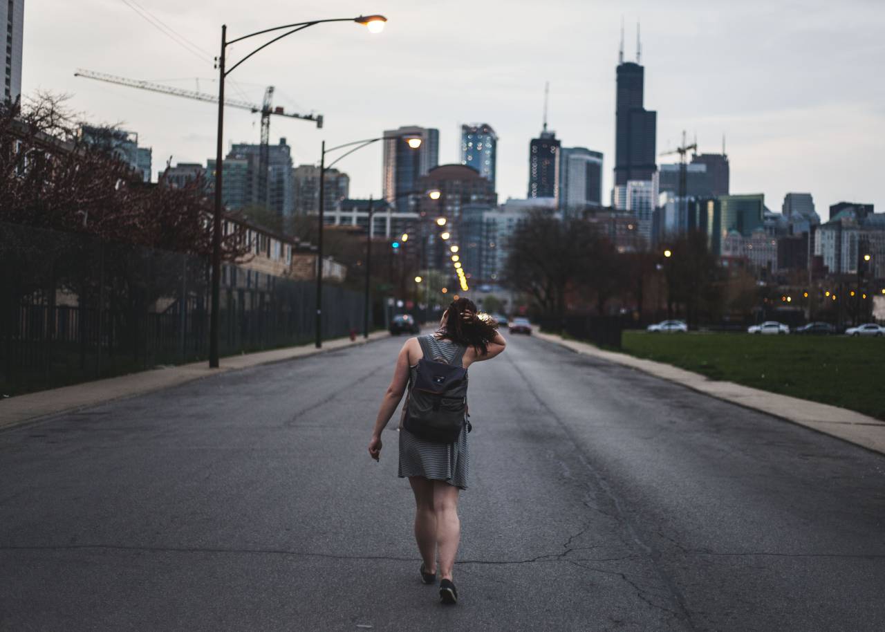 girl, alone, thinking, walking, street, road, car, building, structure, city, pole, lights, green, grass, trees, crane
, 