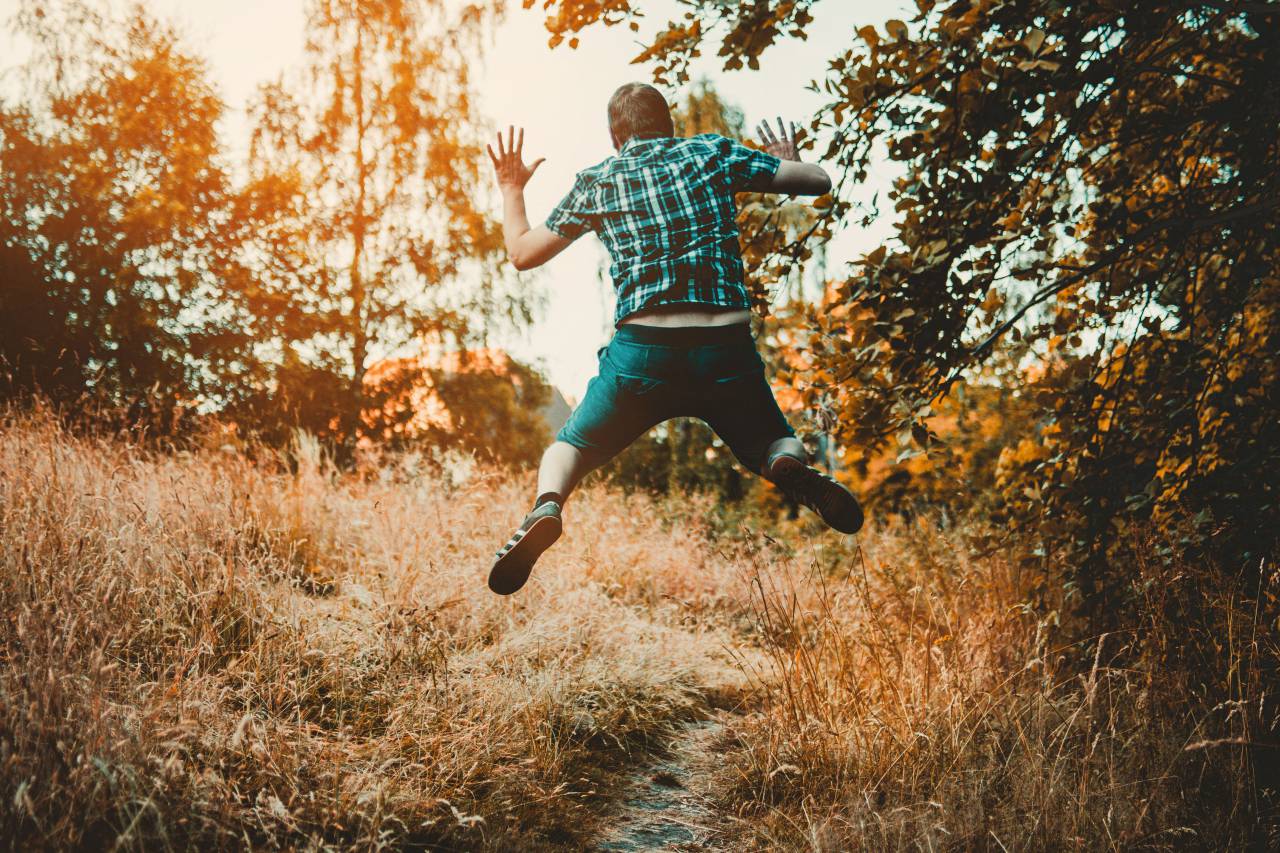 man, jumping, forest, trail, walk, hike, male, sunset, trees, grass, green, shirt, shorts, jeans, leap
, 