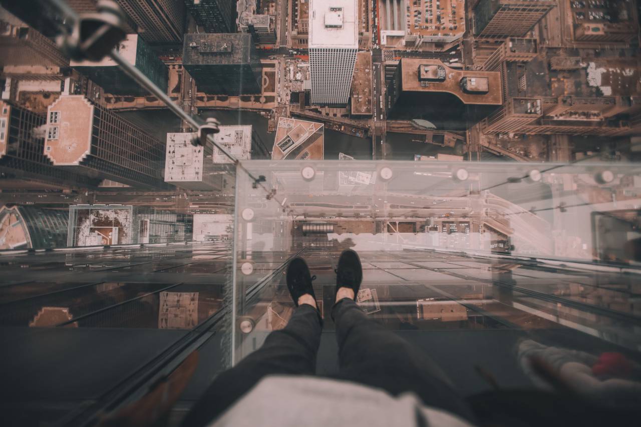 urban, city, establishment, building, structure, infrastructure, tower, aerial, people, man, feet, shoes, roof top, car, vehicle, transportation
, 
