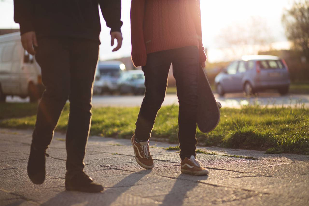 walking, pedestrians, path, sidewalk, city, sunlight, people, skateboard, outdoors, friends
, 