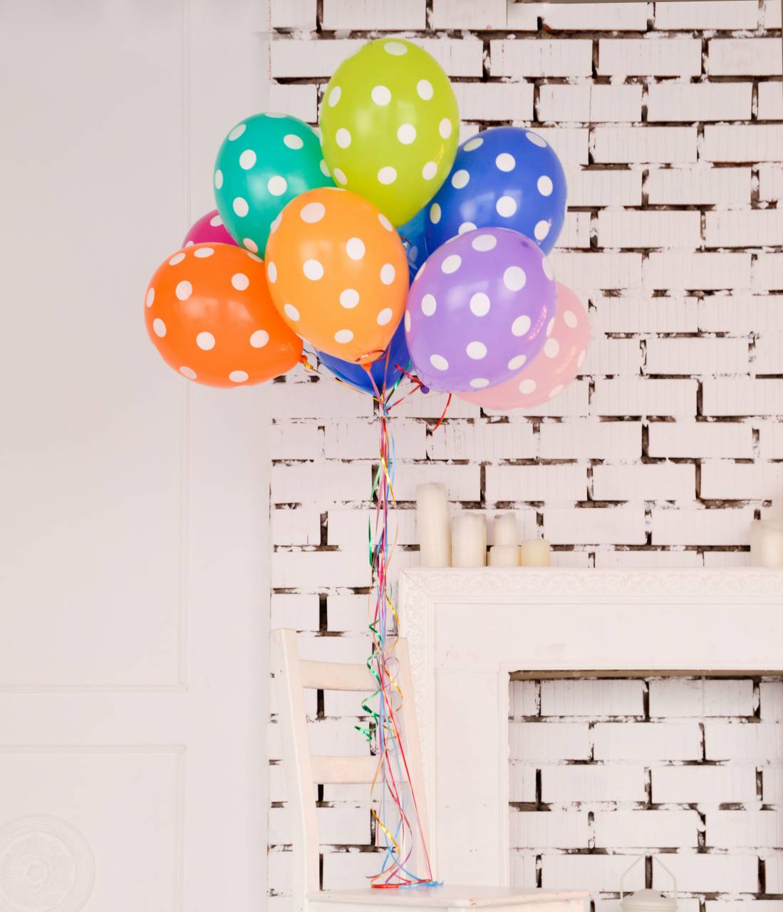 wall, inside, door, table, candle, colorful, green, yellow, blue, orange, pink, purple, birthday, party, balloon
, 