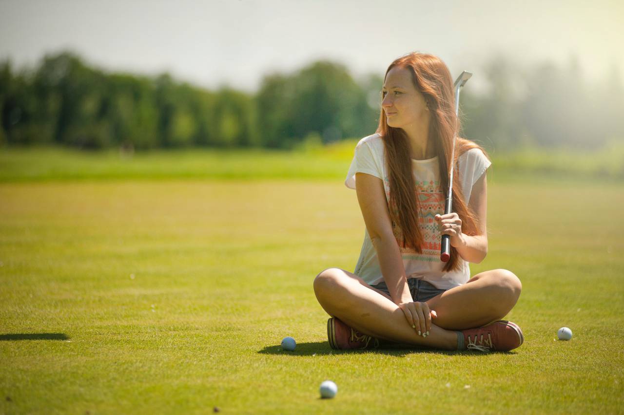 woman, cross legged, golf, course, sunny, warm, ball, sport, people, girl, female, shorts, trees, green, nature
, 