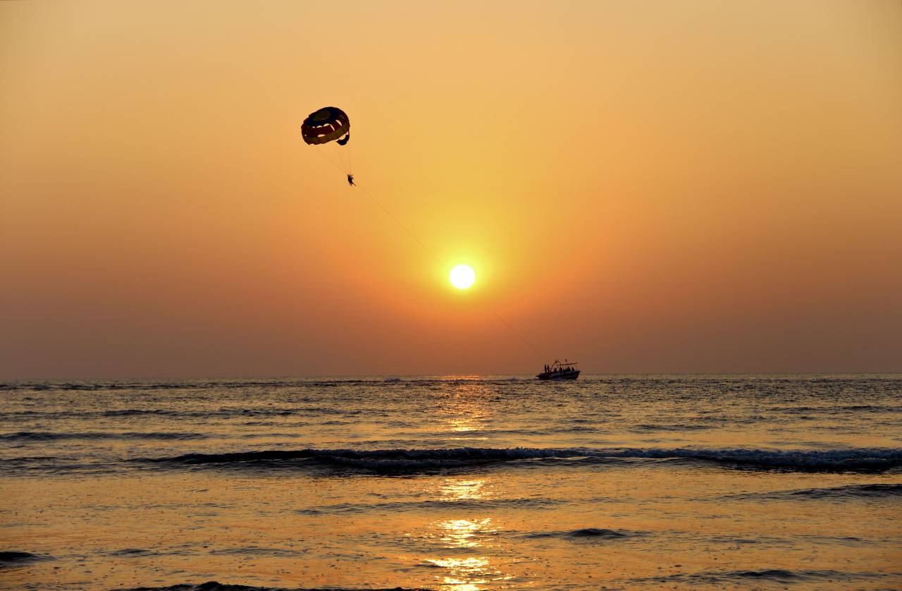 sea, ocean, water, waves, nature, horizon, orange, sky, cloud, sunset, boat, sailing, silhouette, parachute, adventure, sun, reflection
, 