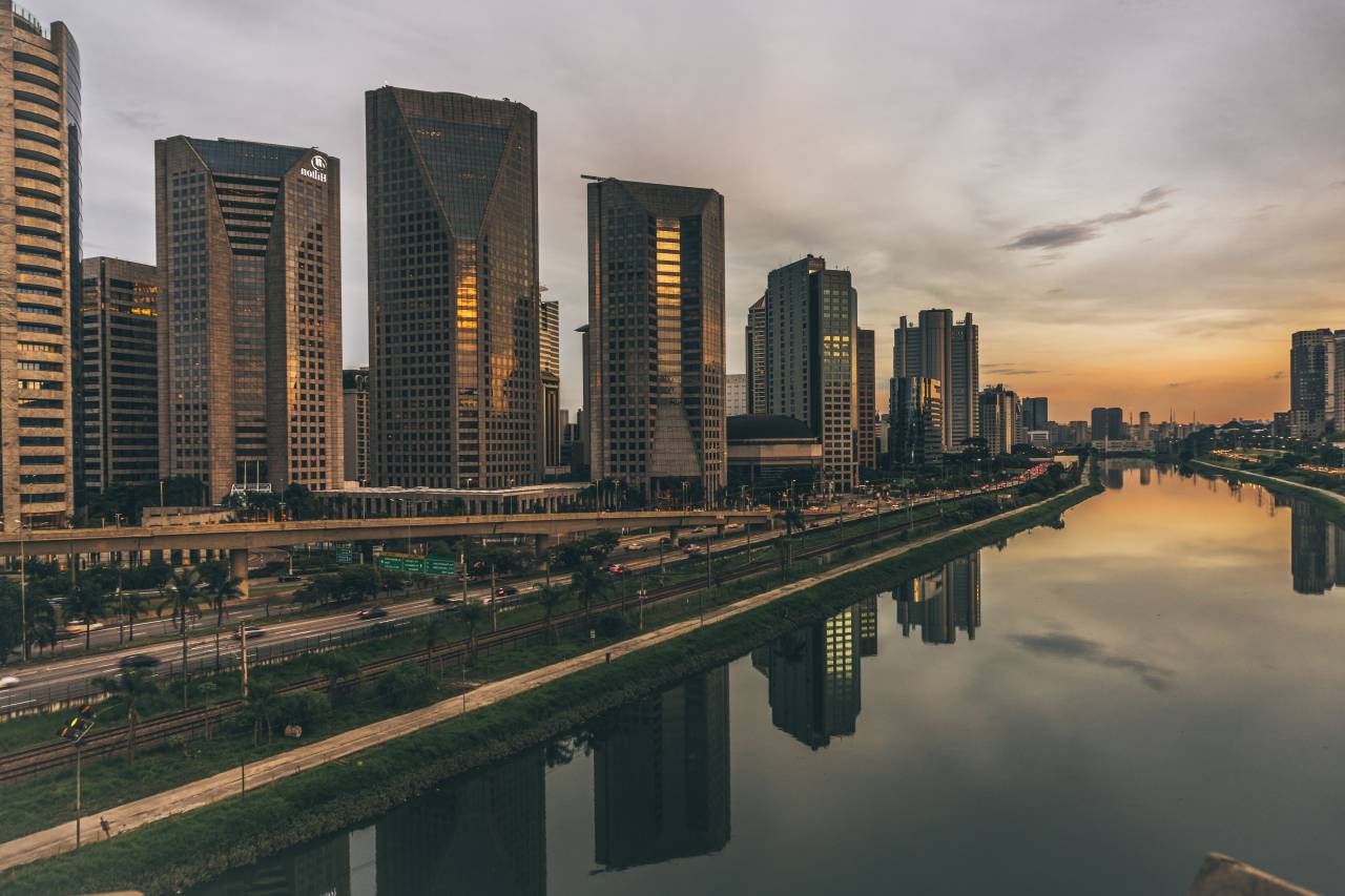 urban, city, establishment, building, structure, infrastructure, tower, clouds, sky, aerial, water, ocean, sea, reflection, sunset, work, office
, 