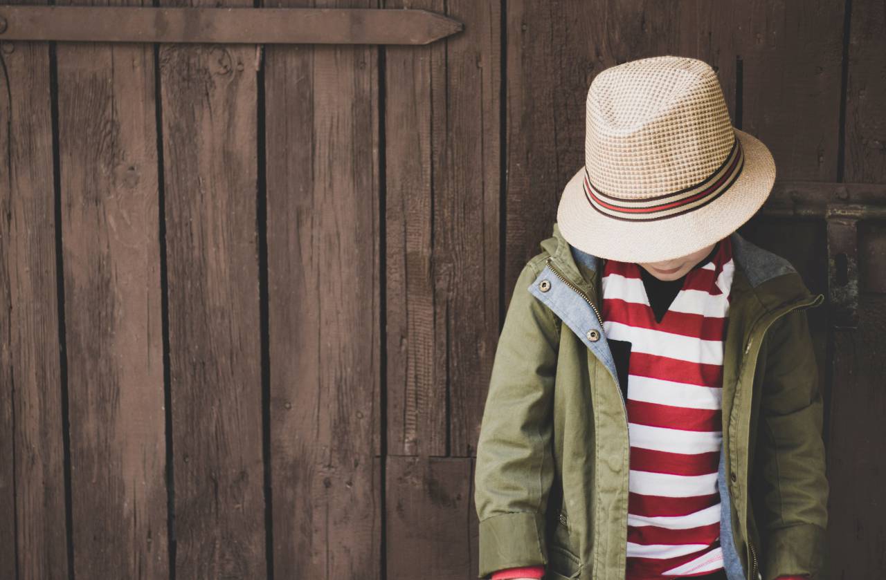 young, child, hat, stripes, red, white, jacket, coat, wood, panel, thought, think, boy, male, family
, 